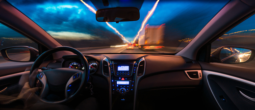 Glare and halos from oncoming headlights at night due to cataracts