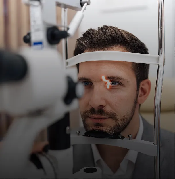 Man has his retina examined.