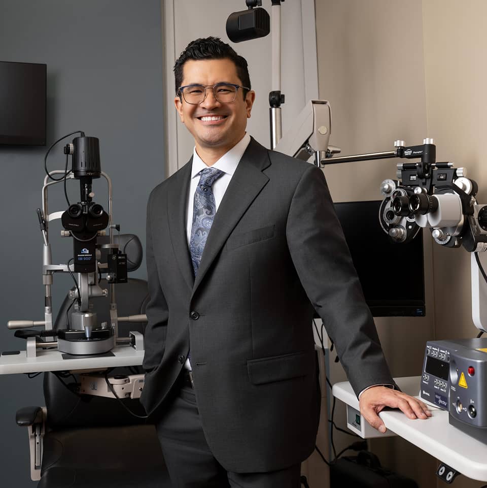 Dr. Keith Tokuhara consulting with a cataract patient