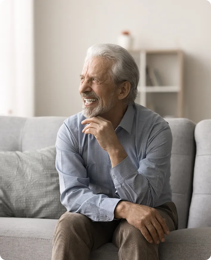 A senior man taking nutritional supplements for macular degeneration.
